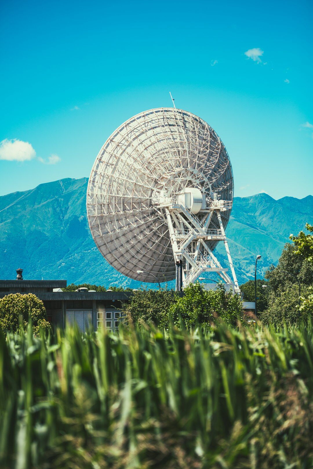 Satellite broadcast van with antenna dish outdoors